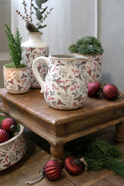 Kanne mit Blättern und Beeren Motiv